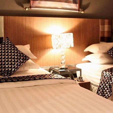 Arenaa Deluxe Hotel Malacca Chambre photo